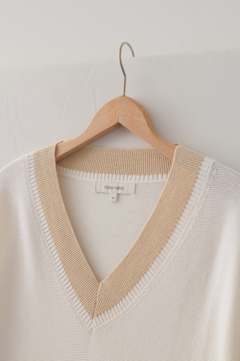 Pull crème avec col en V 
