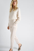 Pantalon écru 7/8 en tissu confort avec élastique au dos