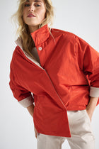 Reversible jacket in orange and beige