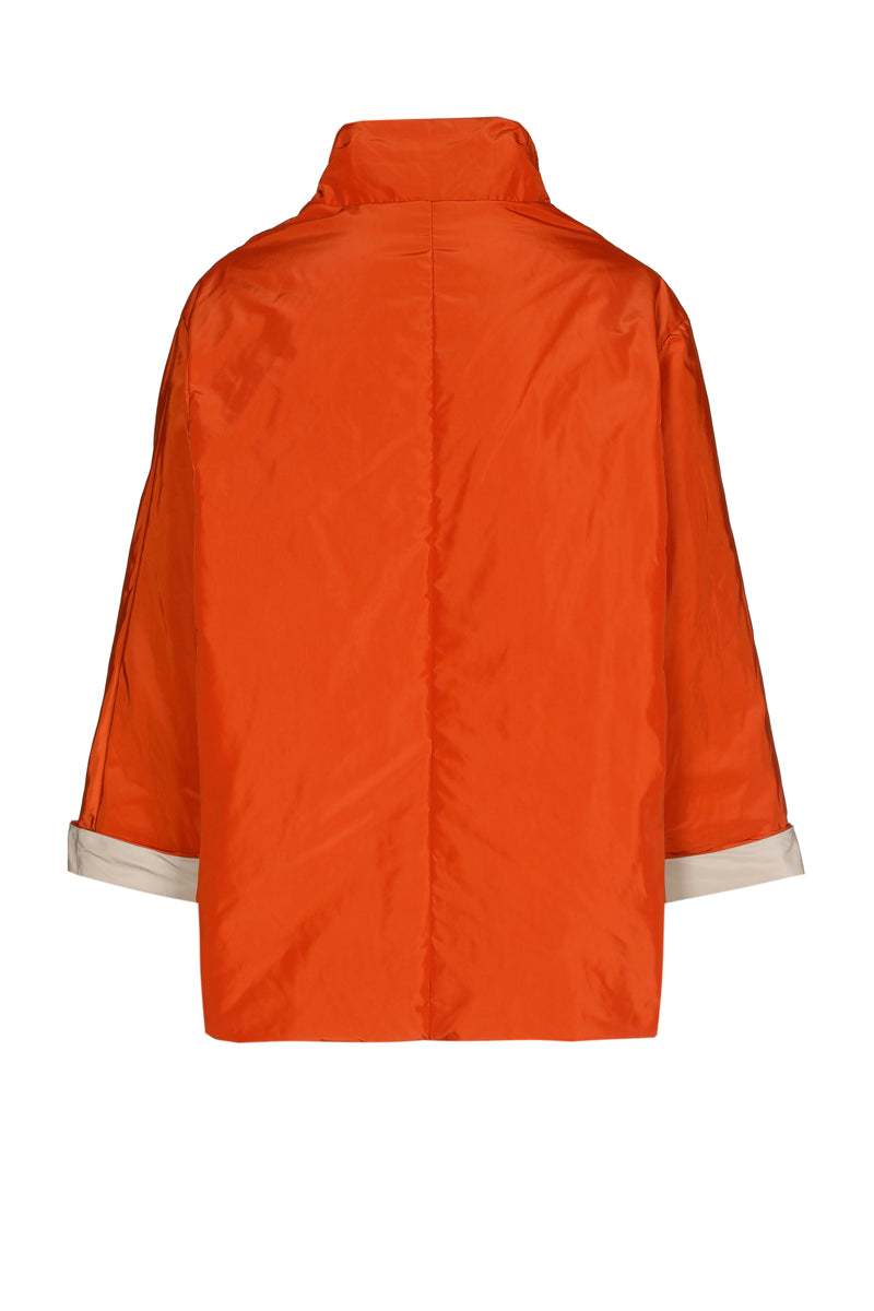Reversible jacket in orange and beige