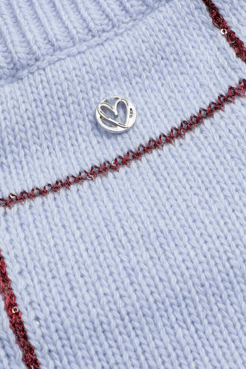 Pull bleu clair à carreaux bordeaux