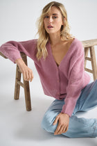 EN EXCLUSIVITÉ DANS NOS CONCEPT STORES: Cardigan rose à boutons