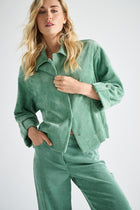 Groen bloesjasje in velours