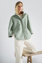 Korte groene jas in wol