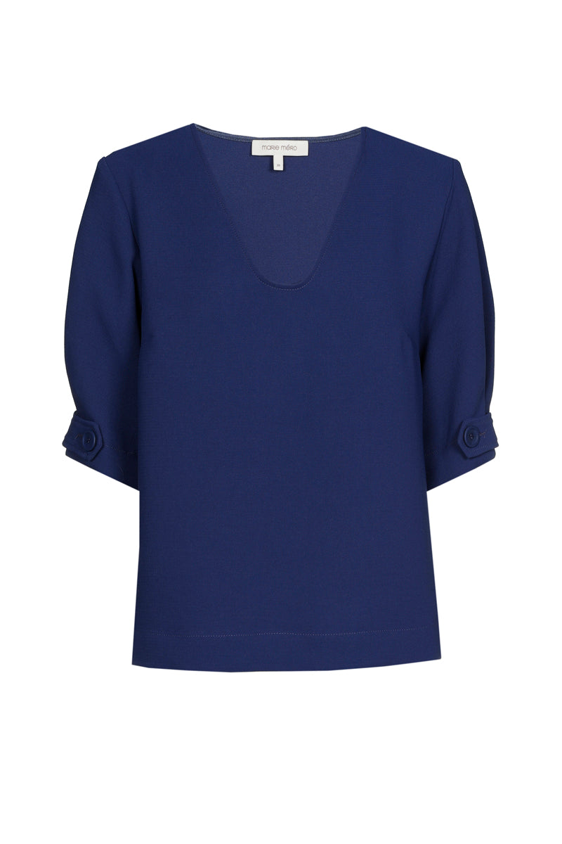 Chemisier bleu à col en V et manches joliment finies