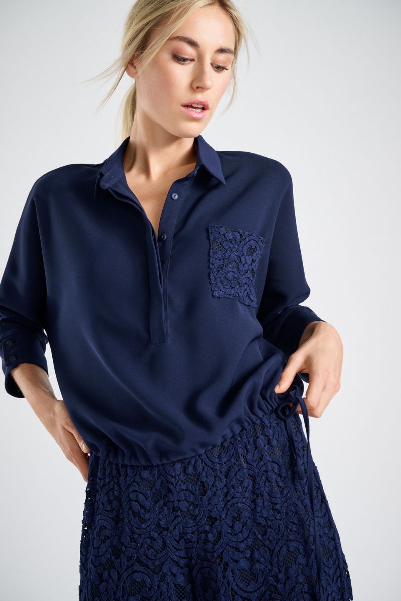 Navy blue blouse with lace breast pocket