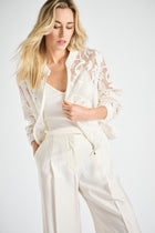 Short zipped jacket with lace print