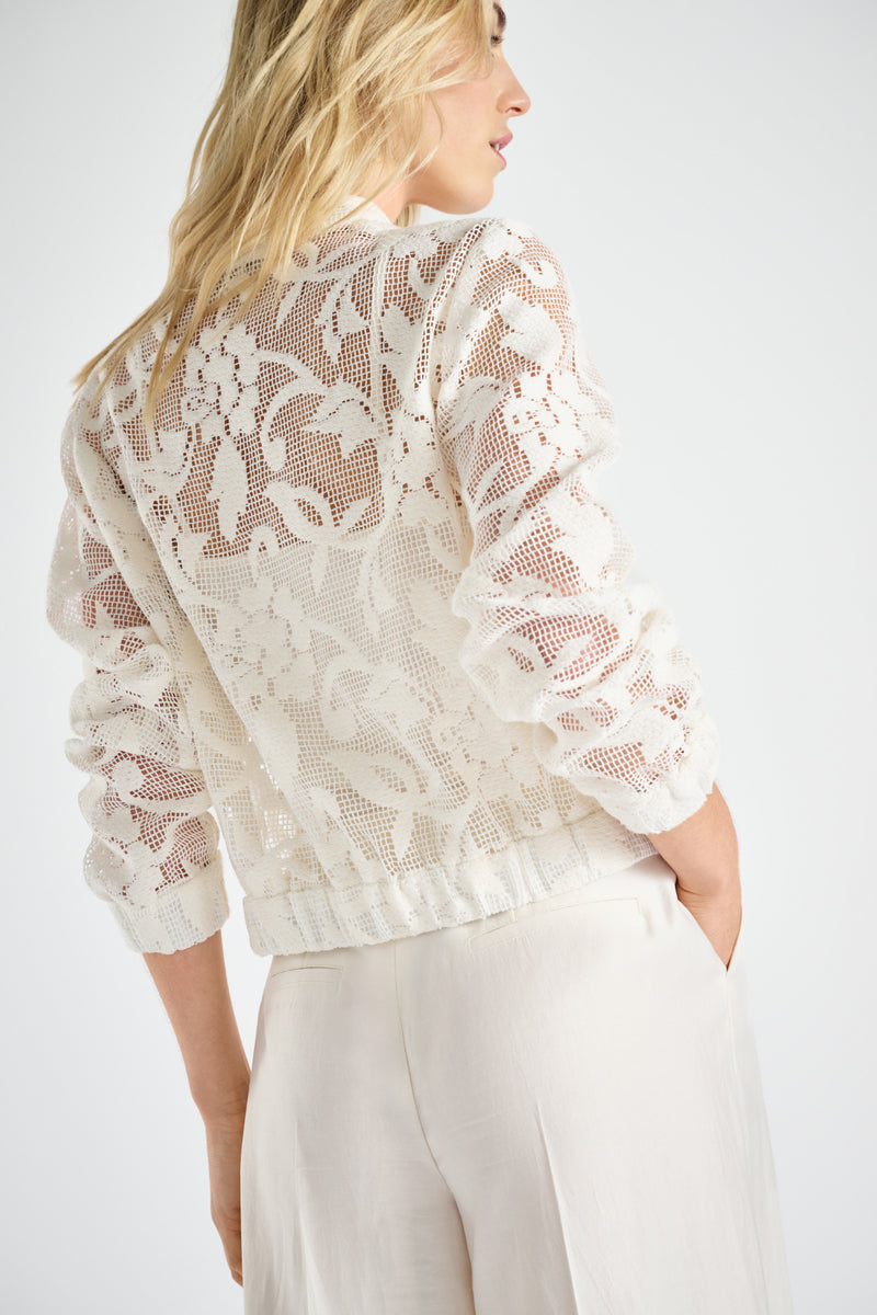 Short zipped jacket with lace print