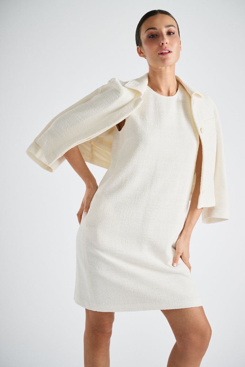 Kort crème mouwloos kleed