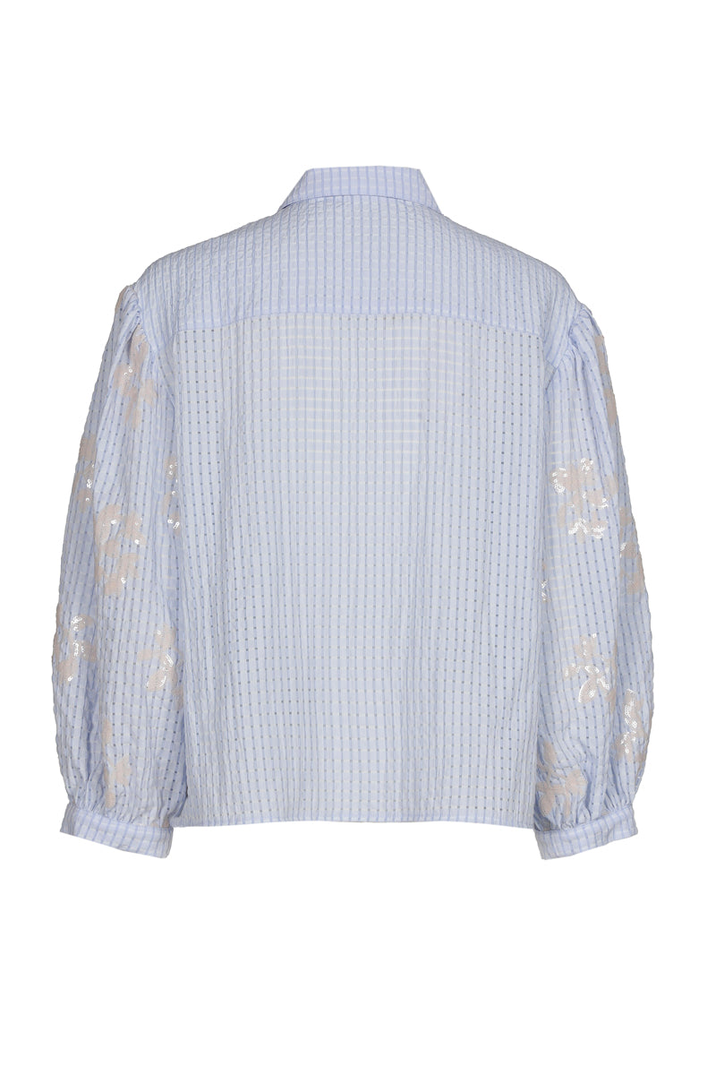 Seersucker bloesje met pailletten op de mouwen