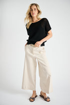 Korte crème lichte broek