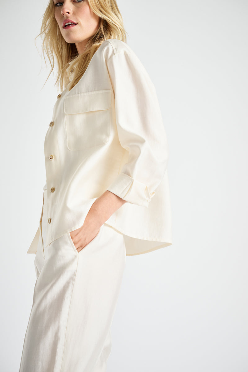 Crèmekleurig bloesjasje