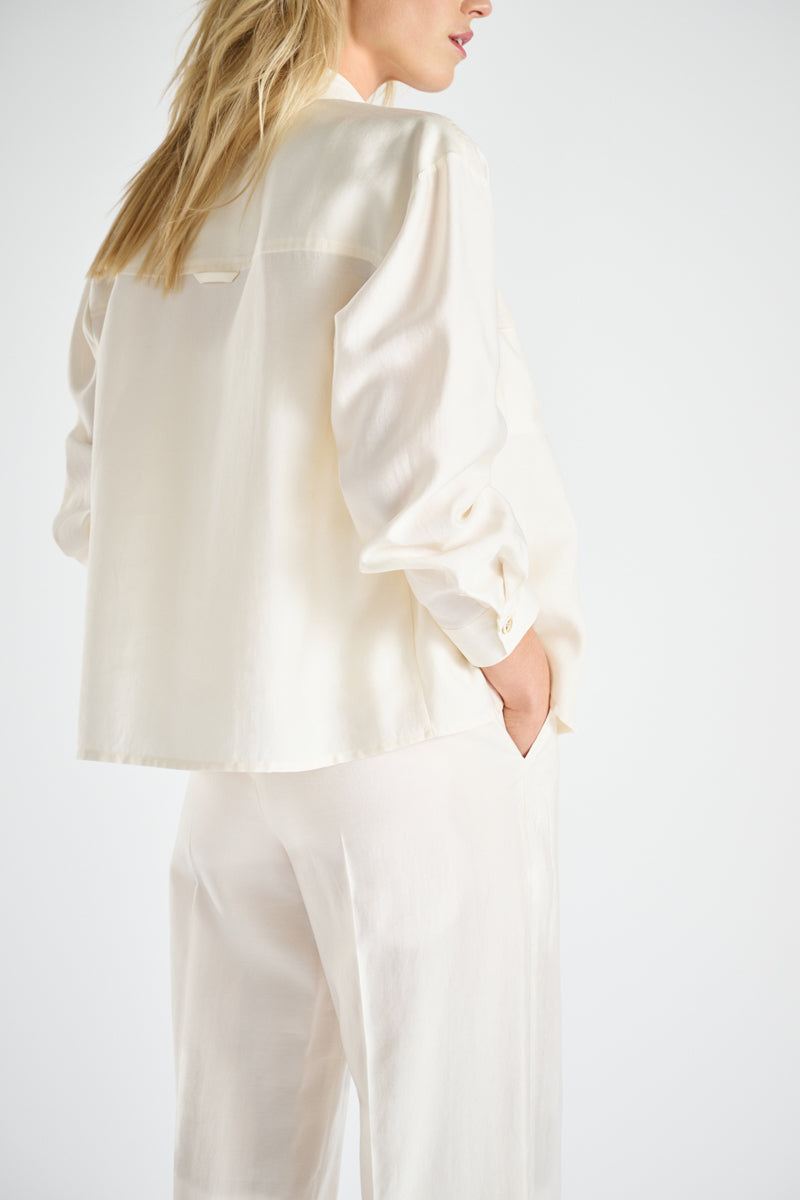 Crèmekleurig bloesjasje