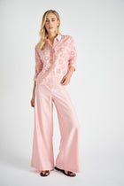 Roze polo-bloes met transparante bloemen