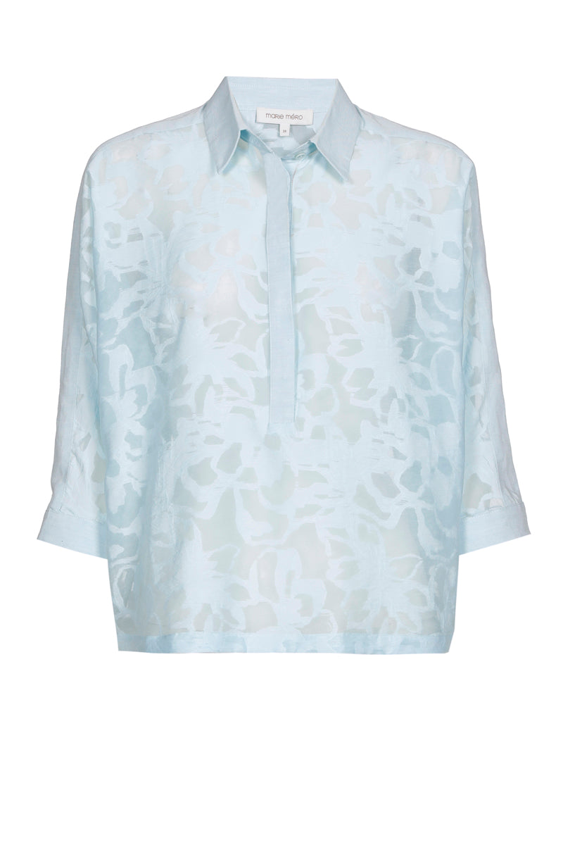 Light blue polo shirt with transparent flowers