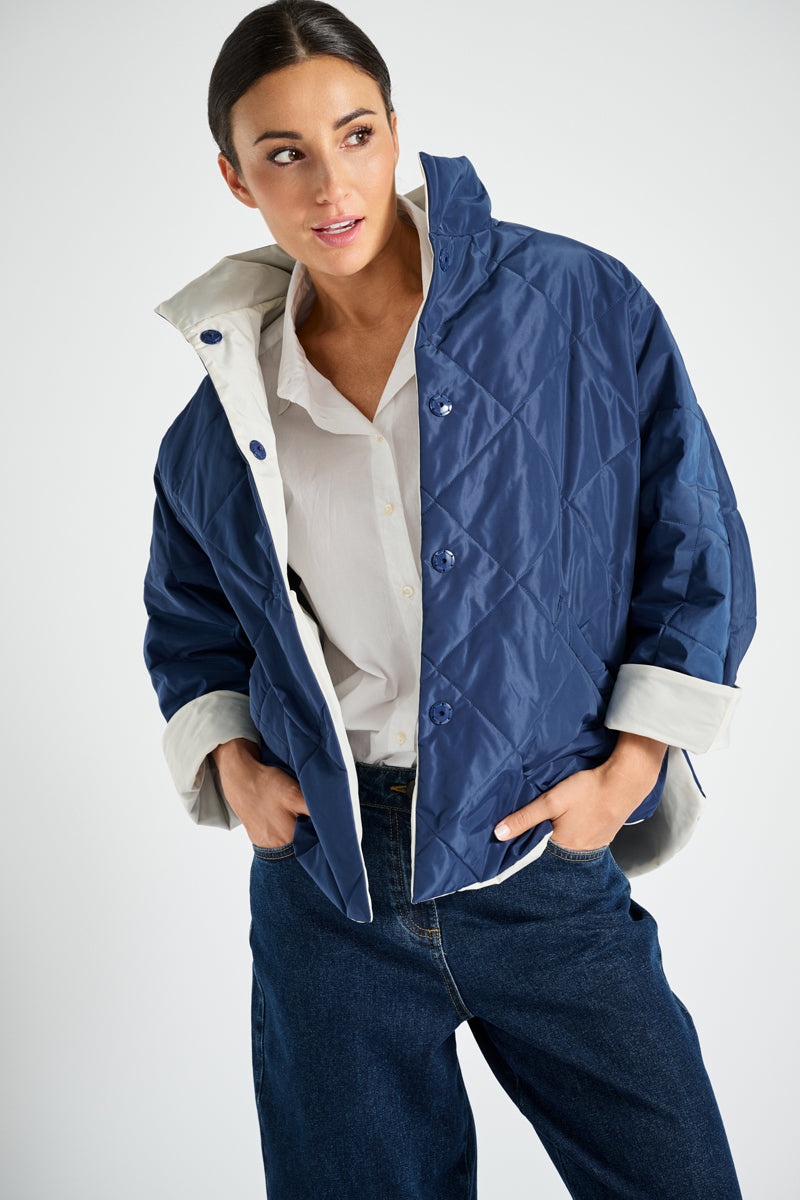 Reversible jacket in navy blue and white