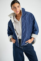 Reversible jacket in navy blue and white
