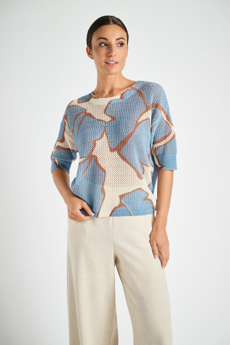 Crochet sweater with blue print