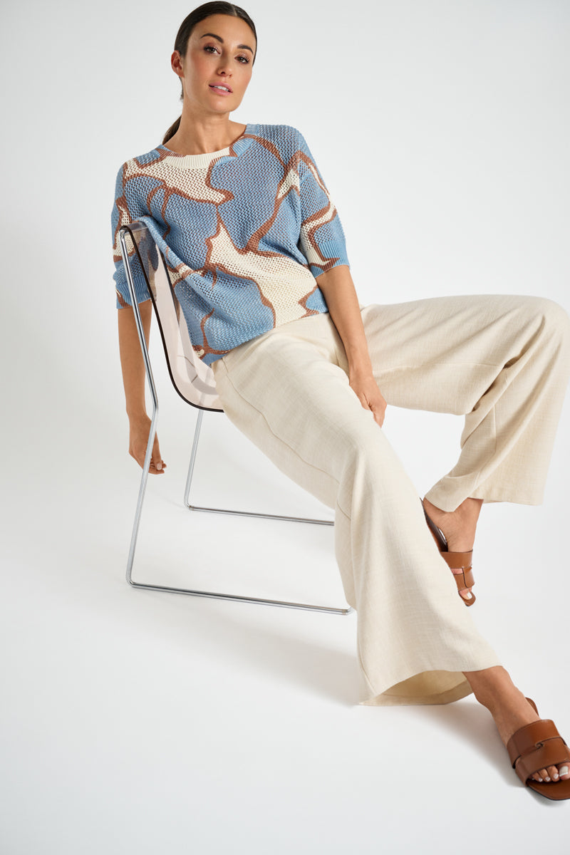 Crochet sweater with blue print