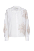 Blouse blanche à fleur beiges