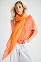 Long cotton-silk scarf in faded orange colors
