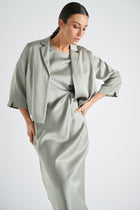 Fluid green dress with short sleeve