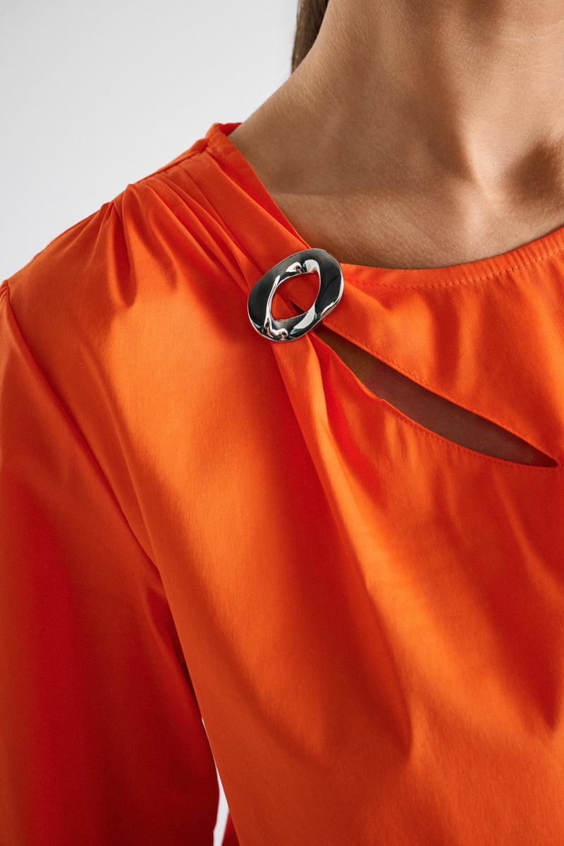 Orange straight cotton dress with brooched collar