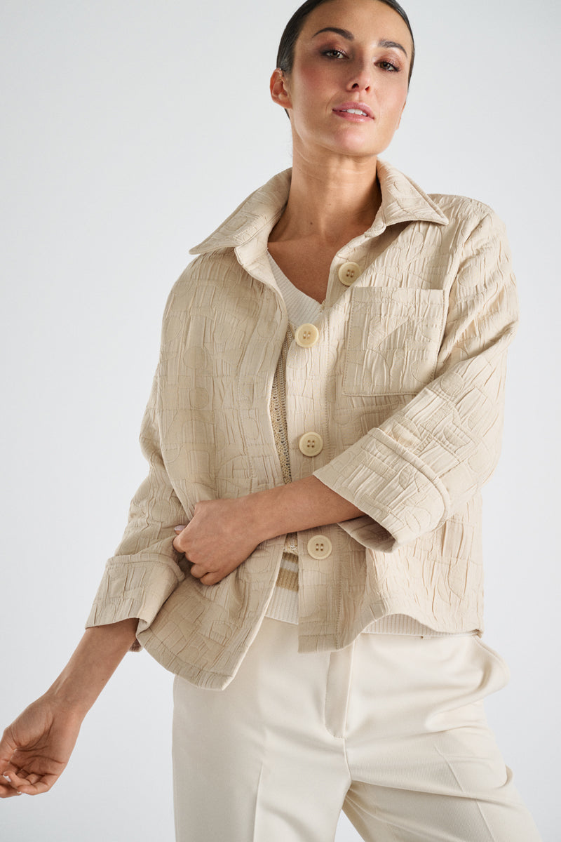 Bicolor trui met aparte steek in beige en crème