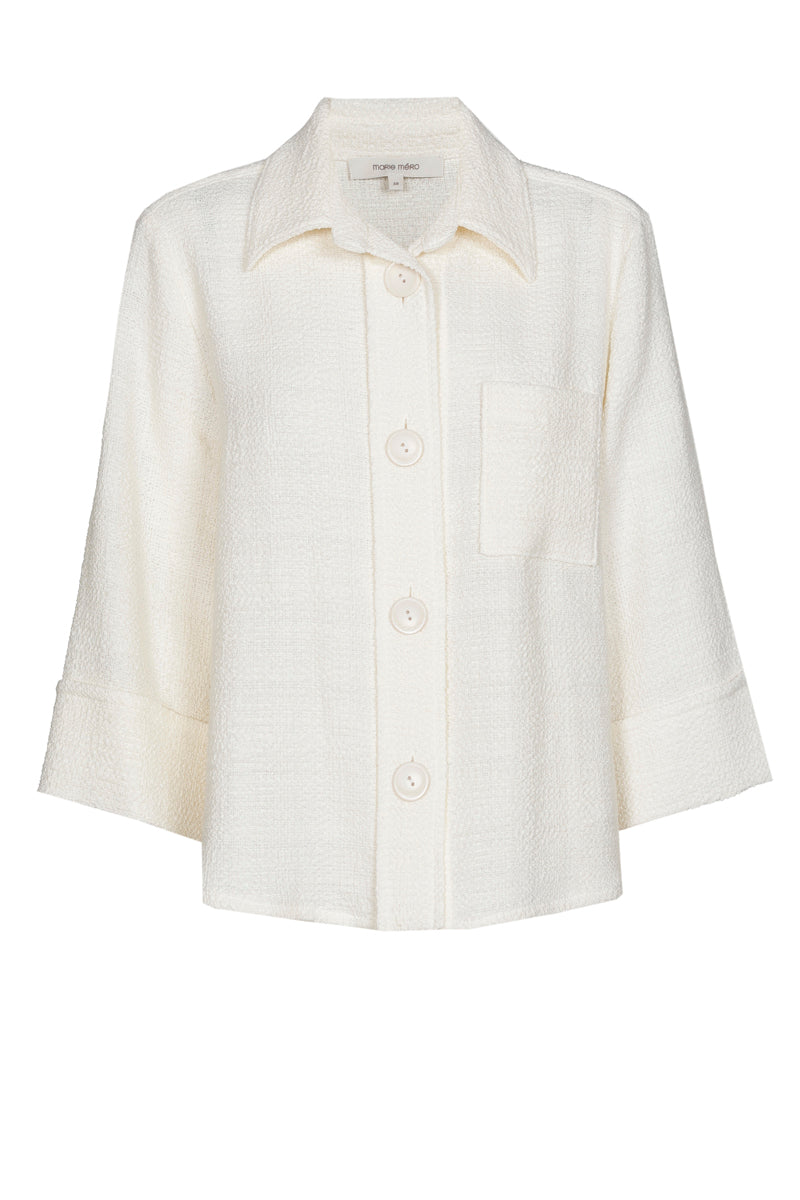 Crèmekleurige bloesjas met kraag en knopen