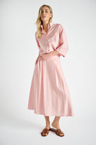 Wijde roze rok met bandplooien en zakken