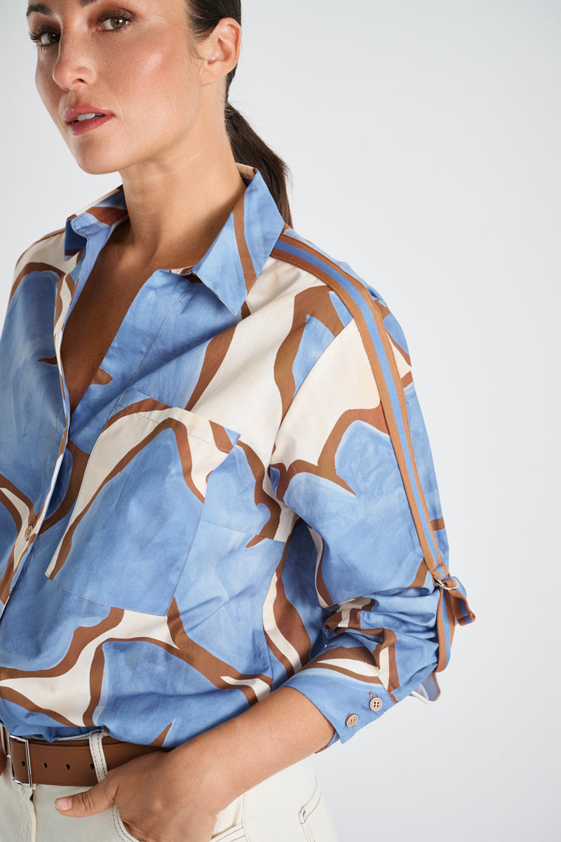 Light blue blouse with floral print