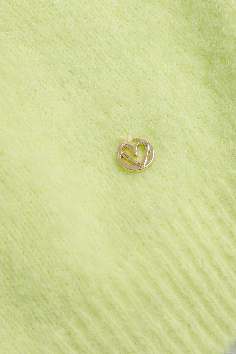 Limoengroene pull met fijne details in alpaca