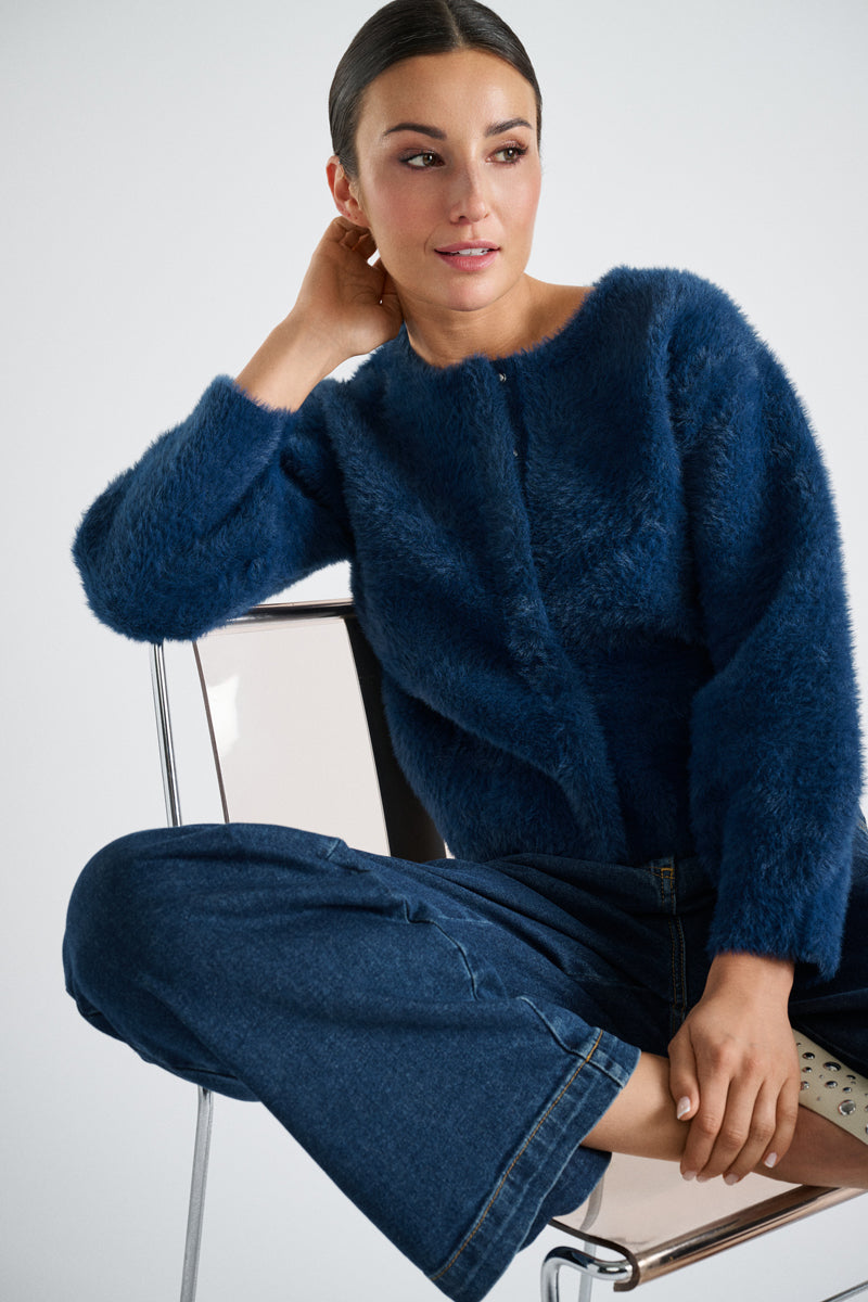 Soft knit cardigan in navy blue with a subtle fluffy look