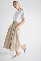 Beige A-line skirt with a belt, box pleats and pockets