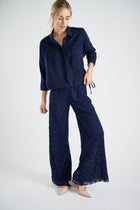 Navy blue blouse with lace breast pocket