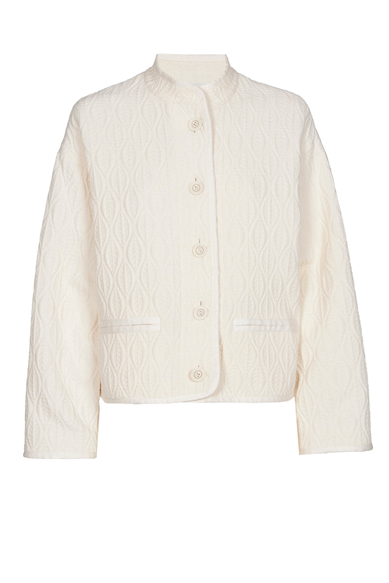 Veste courte couleur crème avec broderie ton sur ton