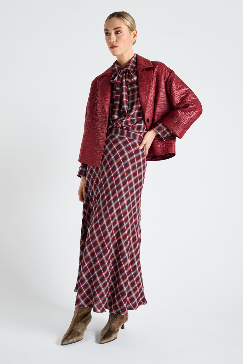 Long, slim and widening checked skirt