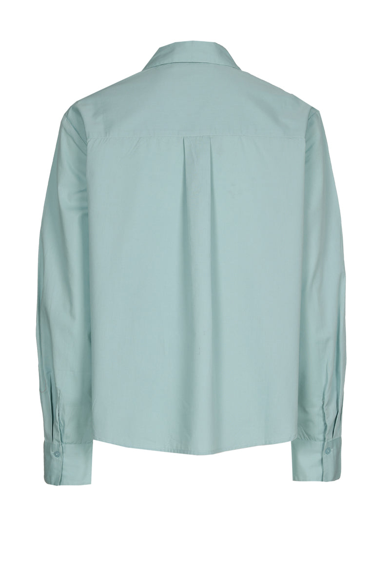 Turquoise bloes met paillettenbloem