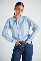 Fine sky blue cashmere-wool sweater with bow collar