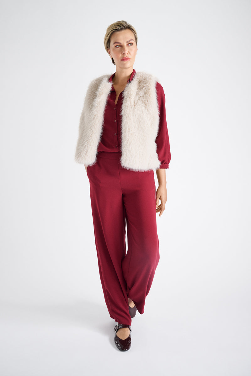 Beige fake fur collarless waistcoat 
