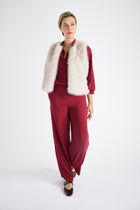 Beige fake fur collarless waistcoat 