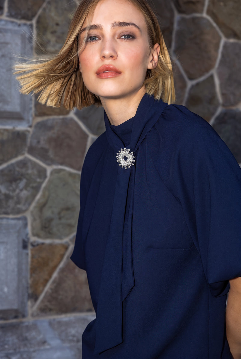Midnight blue tunic blouse with detachable bow and balloon sleeves