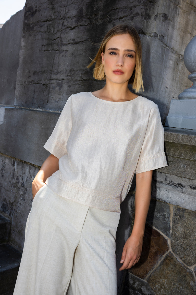Loose champagne-coloured tunic blouse with short sleeves