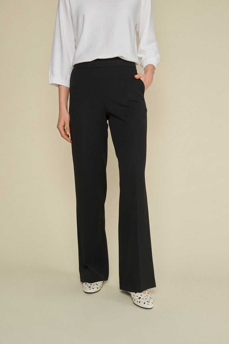 Wide black trousers and elastic waist