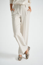 Wide-leg trousers in beige in soft wool quality with button fastening
